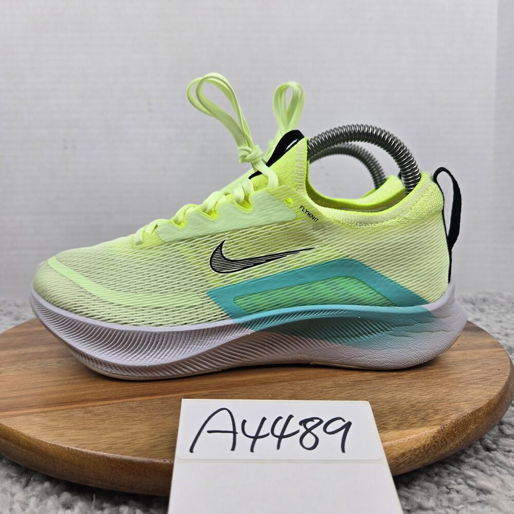 Nike Womens 7.5 Zoom Fly 4 Barely Volt Dynamic Turquoise Fast Pack Running Shoe